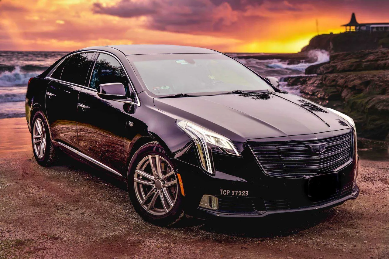 Black Cadillac XTS for sedan rental in Soledad, CA