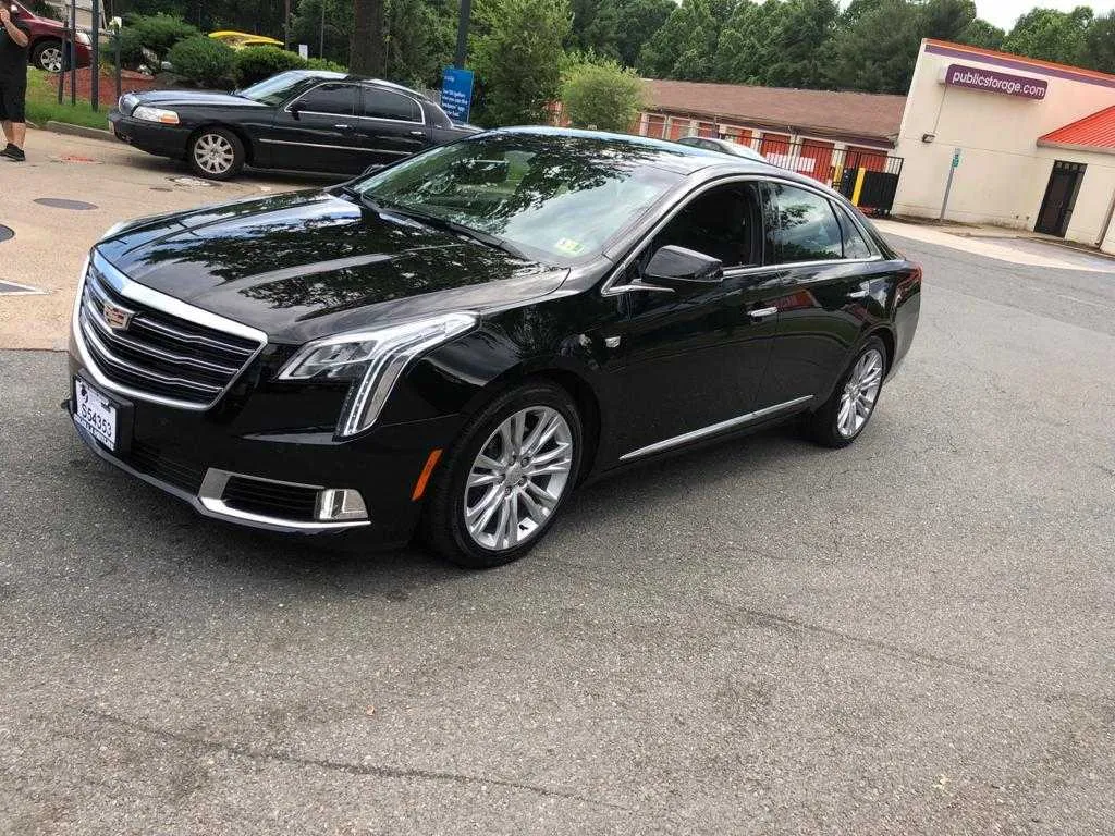Black Cadillac XTS for sedan rental in East Freedom, PA