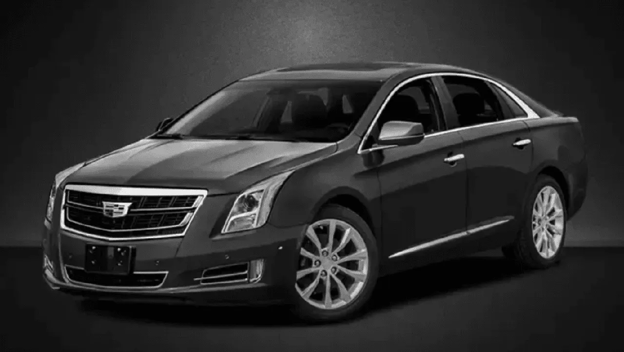 Black Cadillac XTS for sedan rental in Caliente, CA