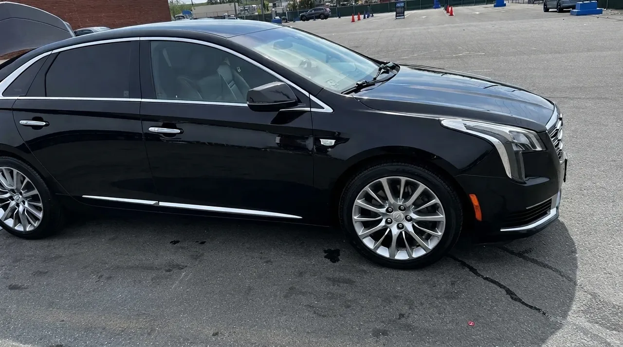 Black Cadillac XTS for sedan rental Black Cadillac XTS for sedan rental