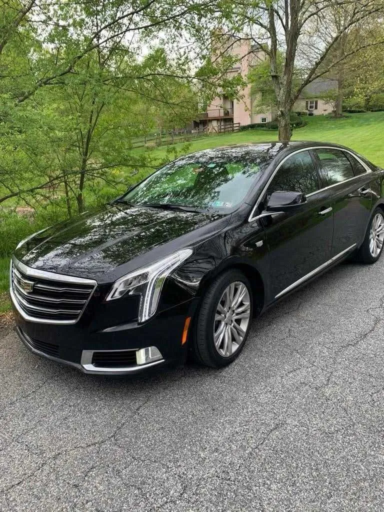 Black Cadillac XTS for sedan rental in Shrewsbury, PA