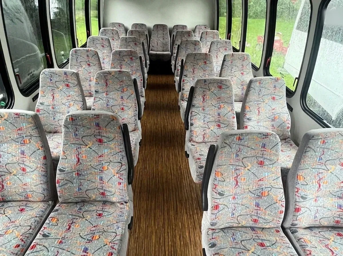 White Chevrolet C45 Shuttle Bus, photo 2 for minibus rental