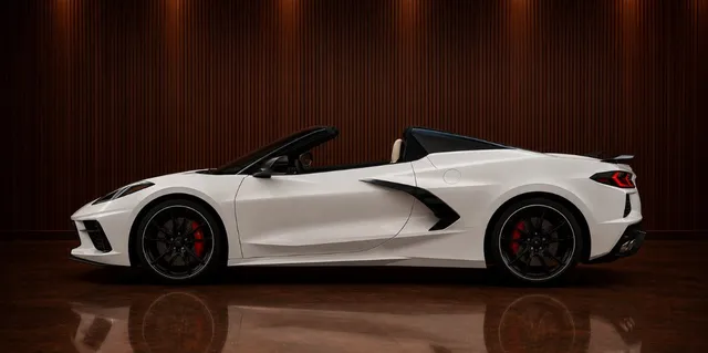 White Chevrolet Corvette exterior with convertible roof for sports car rental