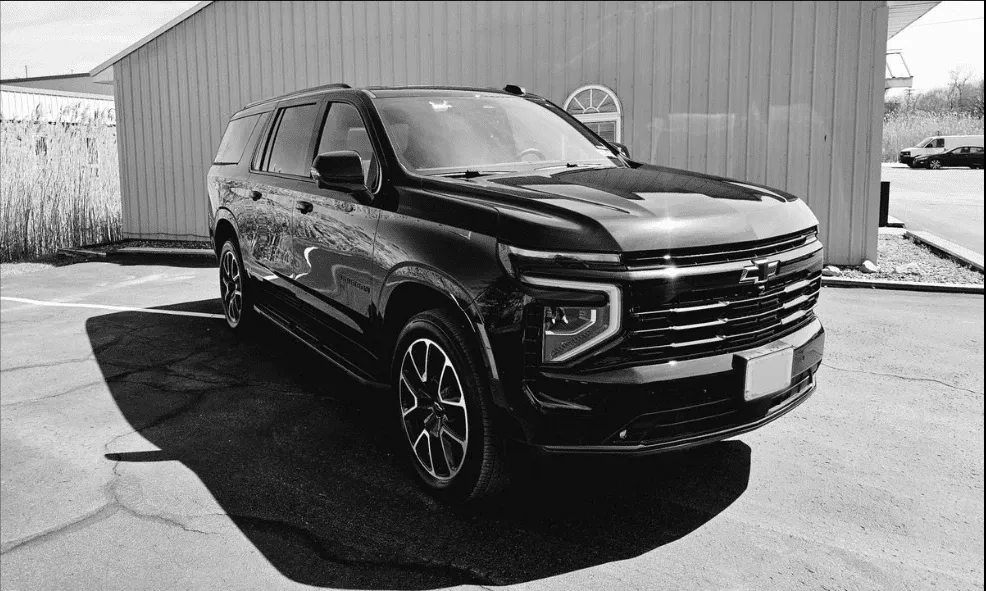 Black Chevrolet Suburban for airport transfers