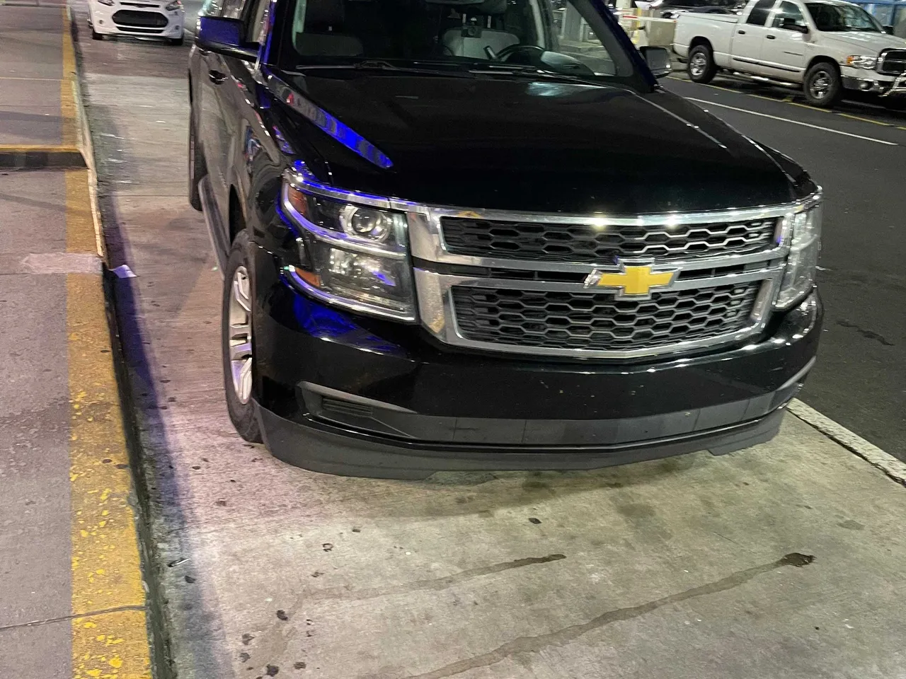 Black Chevrolet Suburban for airport transfers