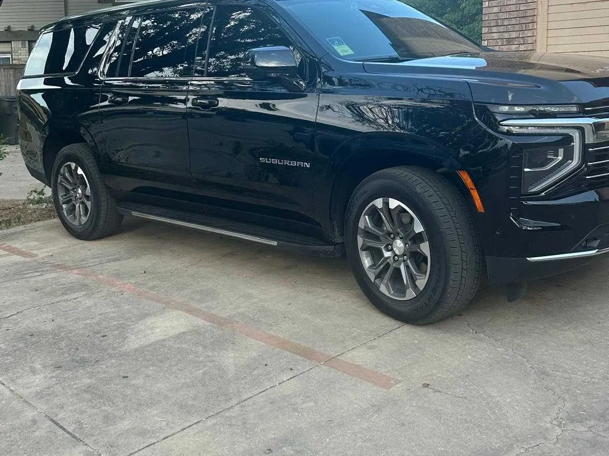 Black Chevrolet Suburban for airport transfers