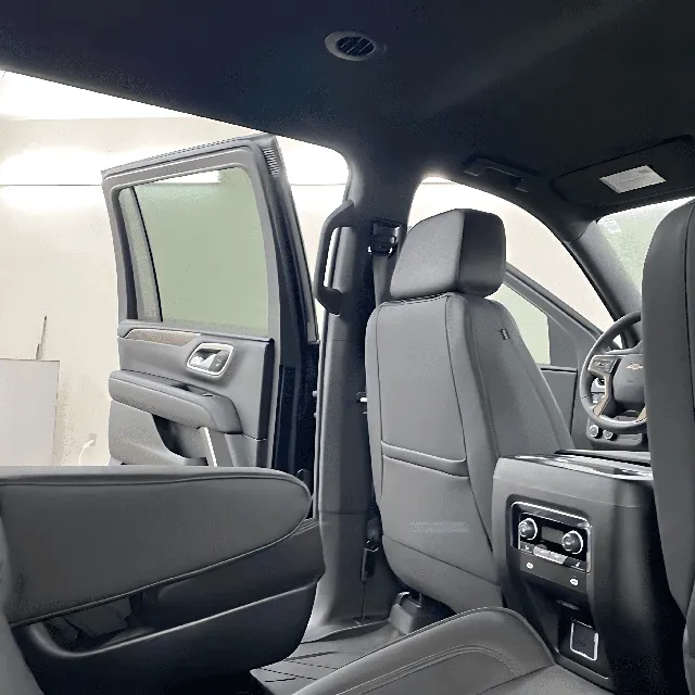 Chevrolet Suburban interior with rear passenger controls for airport transfers in Runnels County, TX