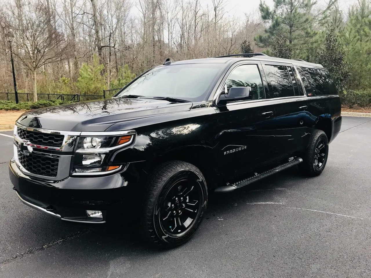 Black Chevrolet Suburban Premier Luxury SUV for winery tour transport in Contra Costa County, CA
