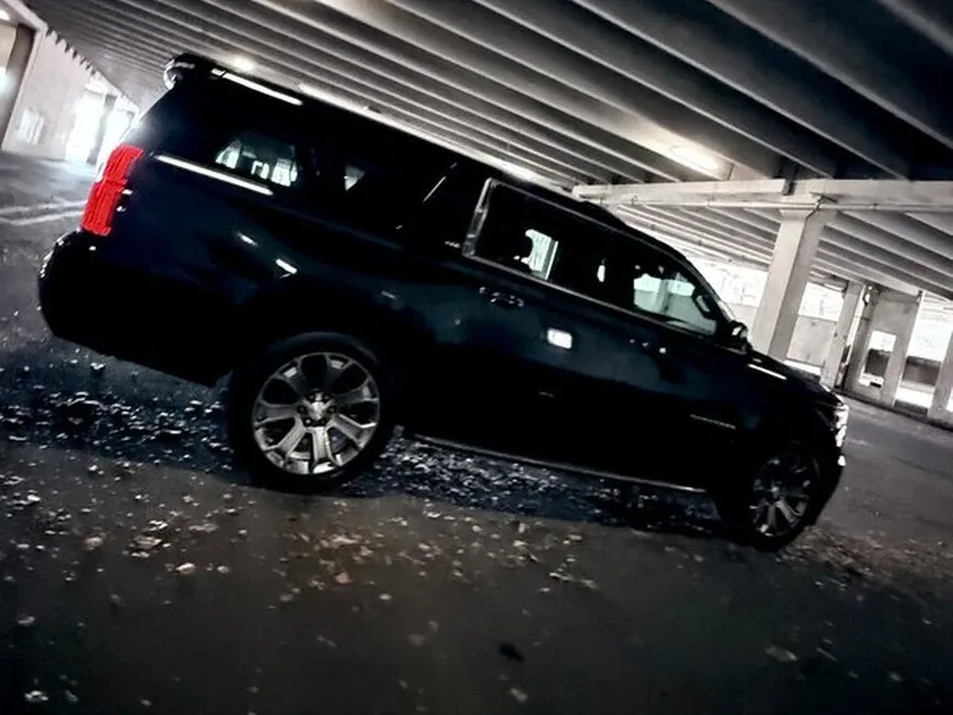 Black Chevrolet Suburban XLT, photo 5 for airport transfers