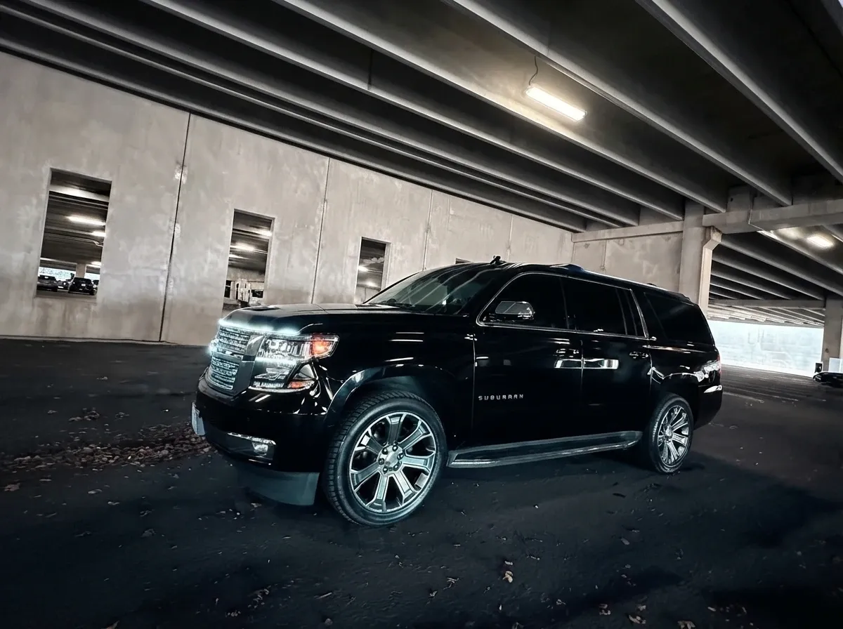 Black Chevrolet Suburban XLT for airport transfers Black Chevrolet Suburban XLT for airport transfers