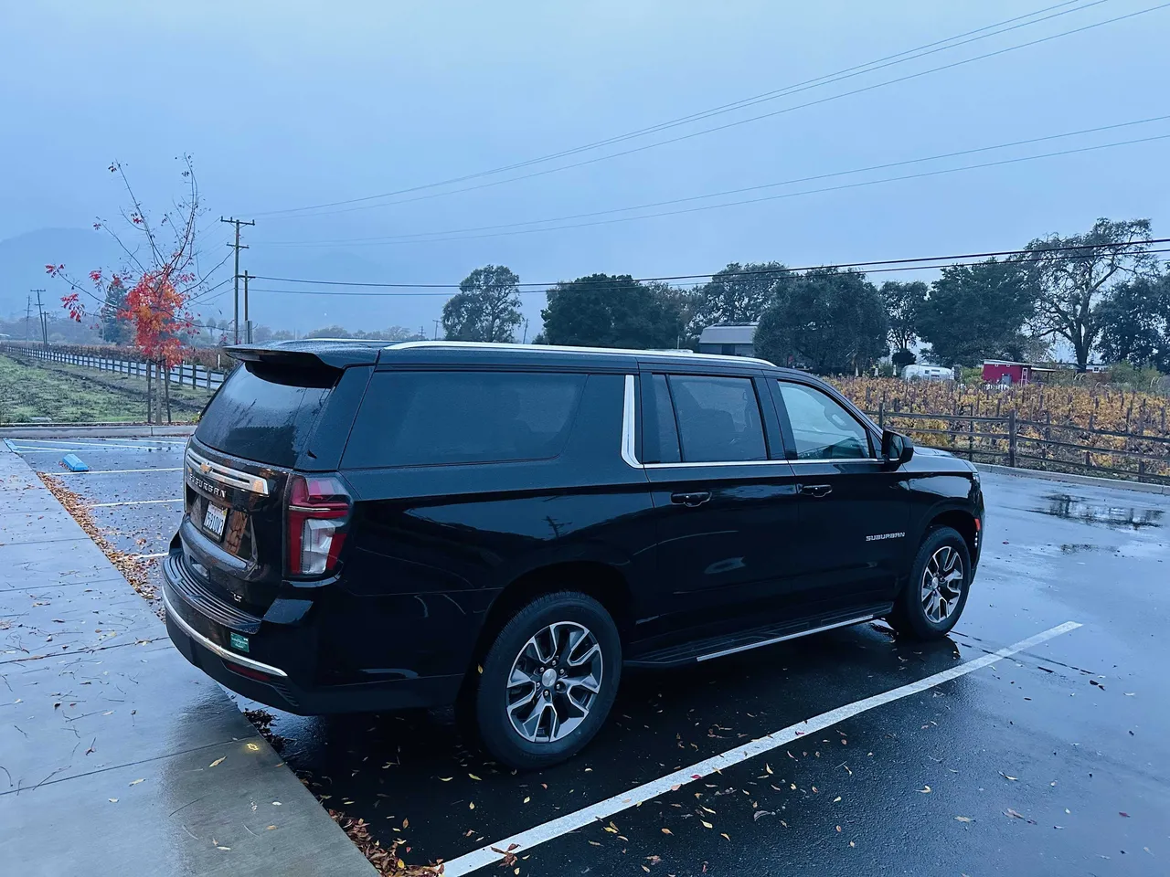 Black Chevy Suburban exterior with running boards for airport transfers in Millbrae, CA