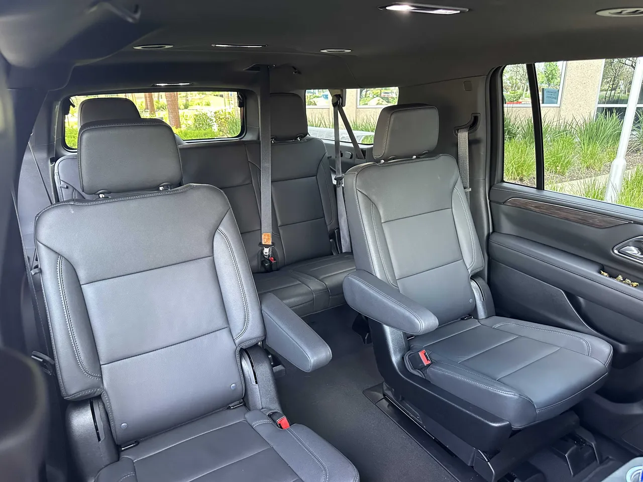 Chevy Suburban interior with captain's chairs for airport transfers in Millbrae, CA