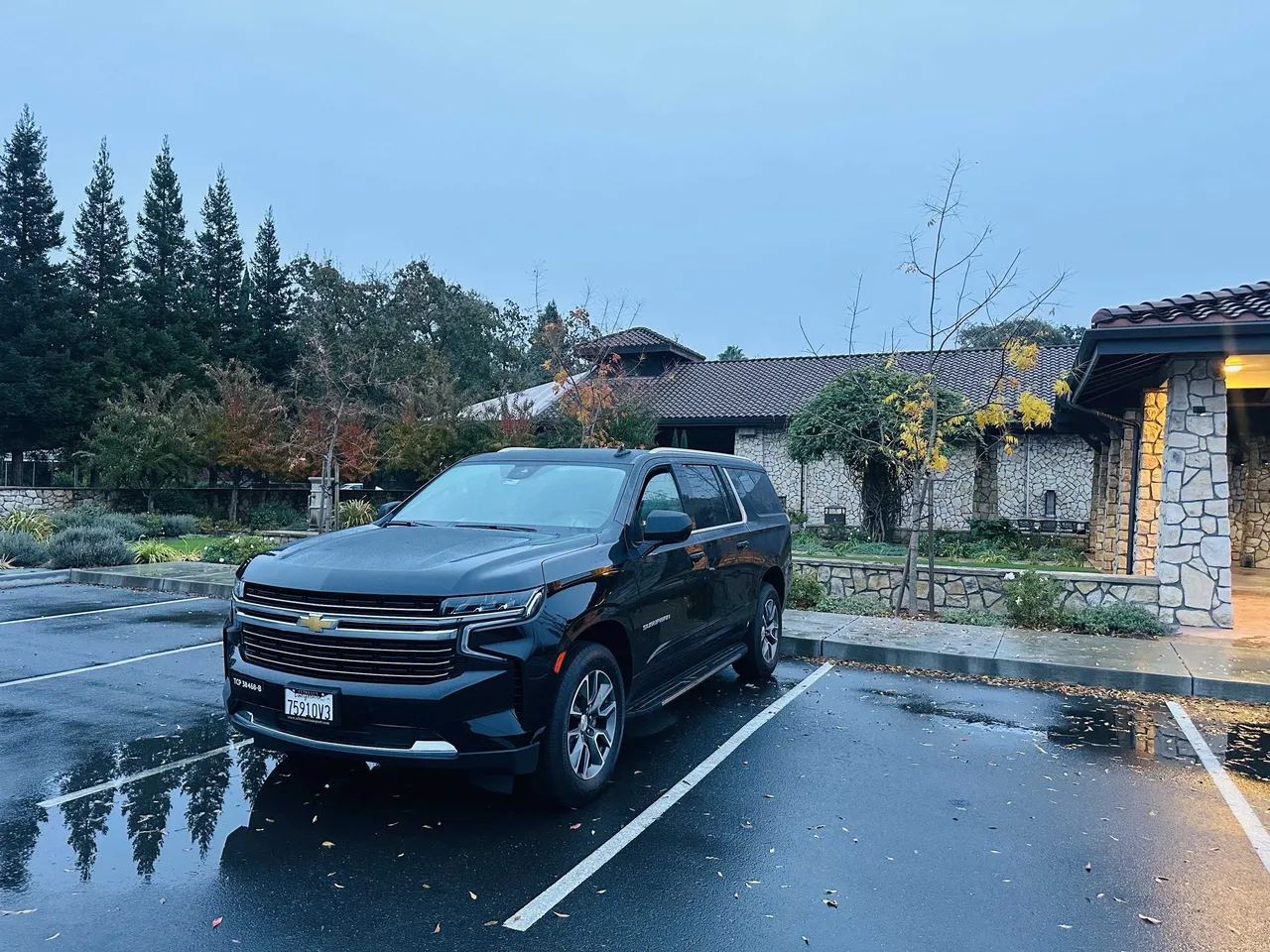 Black Chevy Suburban with running boards for airport transfers in Millbrae, CA