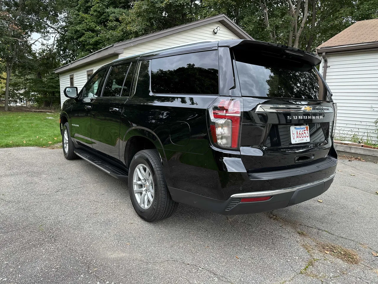 Black Chevrolet Suburban with tinted windows and running boards for airport transfers Black Chevrolet Suburban with tinted windows and running boards for airport transfers