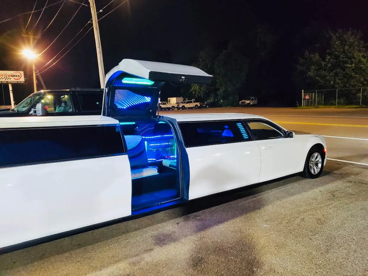 White Chrysler 300 Jet Doors with bridal (jet) door for limo rental White Chrysler 300 Jet Doors with bridal (jet) door for limo rental