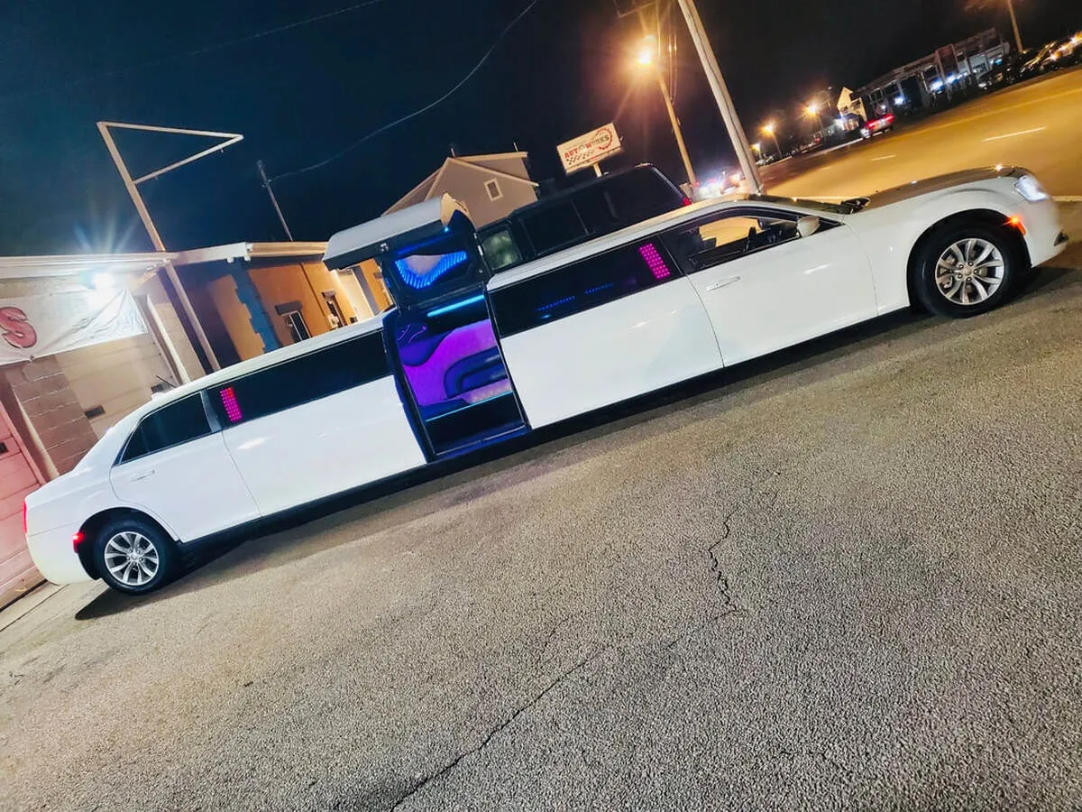White Chrysler 300 Jet Doors exterior with bridal (jet) door for limo rental White Chrysler 300 Jet Doors exterior with bridal (jet) door for limo rental