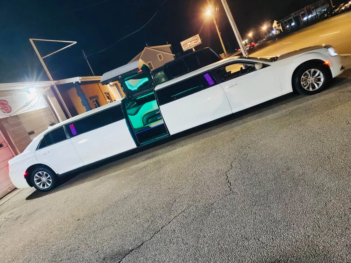 White Chrysler 300 Jet Doors exterior with bridal (jet) door, photo 3 for limo rental White Chrysler 300 Jet Doors exterior with bridal (jet) door, photo 3 for limo rental