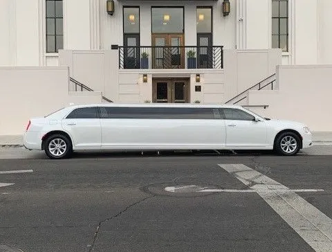White Chrysler 300 Stretch for cadillac escalade limo in Madison, MN
