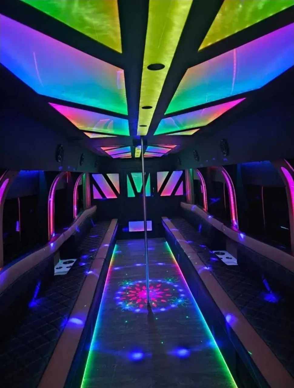 White D-Lux Party Bus exterior for party bus rental in Bay City, TX