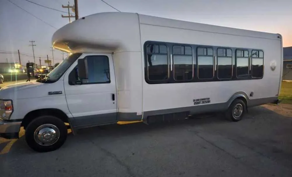 White D-Town Bus exterior for party bus rental in Hamburg, IA
