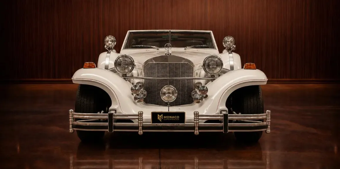 White Excalibur Phaeton (Vintage) exterior for wedding car rental