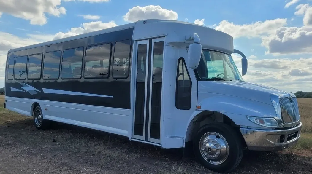White 27 Passenger Executive Shuttle Bus for minibus rental White 27 Passenger Executive Shuttle Bus for minibus rental