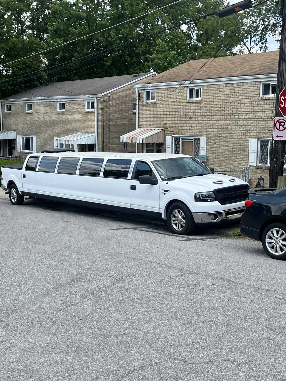 White F150 Limousine exterior, photo 2 for limo rental in Benezett, PA