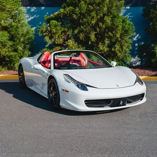 Ferrari 458 Spider Bianco Avus for sports car rental in Rockville, MD Ferrari 458 Spider Bianco Avus for sports car rental in Rockville, MD