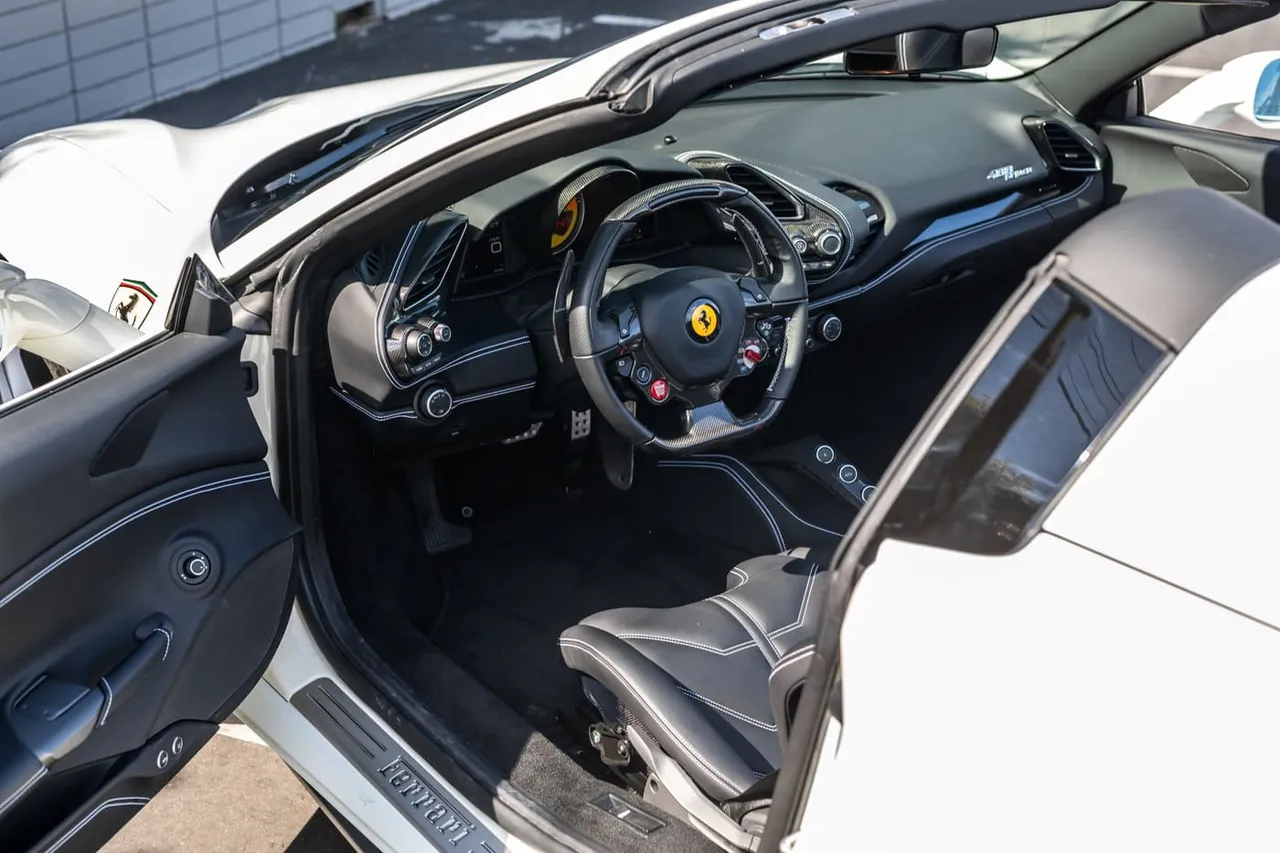 White Ferrari 488 Spider, photo 8 for exotic car rental in Houston, TX White Ferrari 488 Spider, photo 8 for exotic car rental in Houston, TX