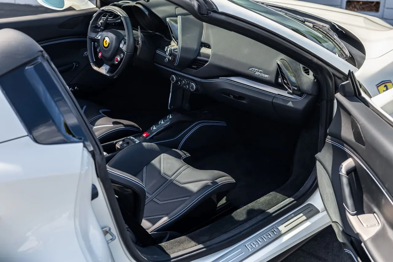 White Ferrari 488 Spider, photo 9 for exotic car rental in Houston, TX White Ferrari 488 Spider, photo 9 for exotic car rental in Houston, TX