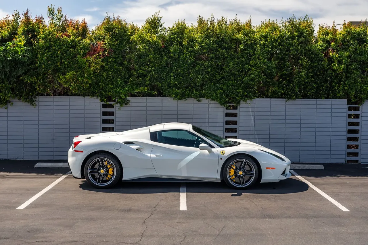 White Ferrari 488 Spider, photo 3 for sports car rental White Ferrari 488 Spider, photo 3 for sports car rental