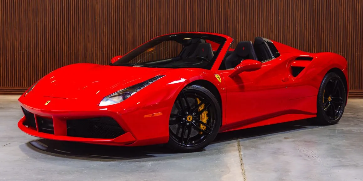 Red Ferrari 488 Spider for exotic car rental in Alto, MI