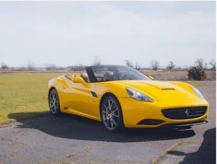 Yellow Ferrari California Convertible for exotic car rental in Castle Hayne, NC