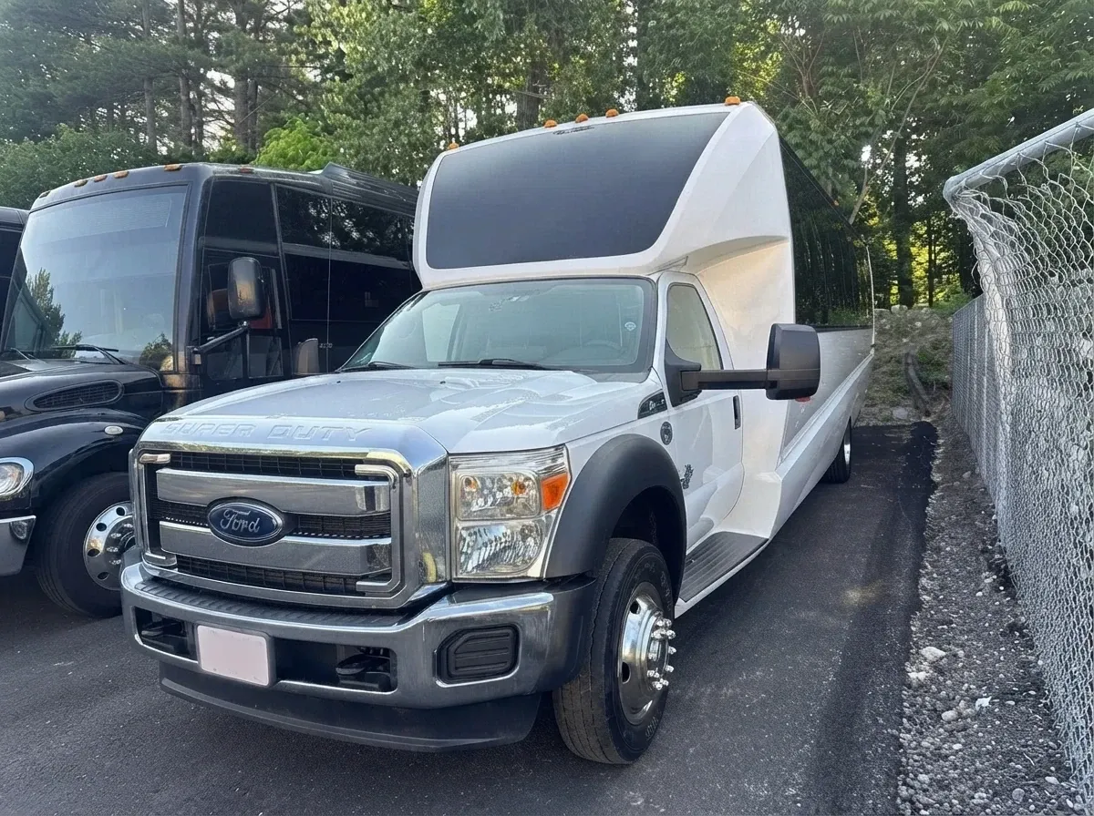 White Ford 550 Mini Coach for minibus rental White Ford 550 Mini Coach for minibus rental