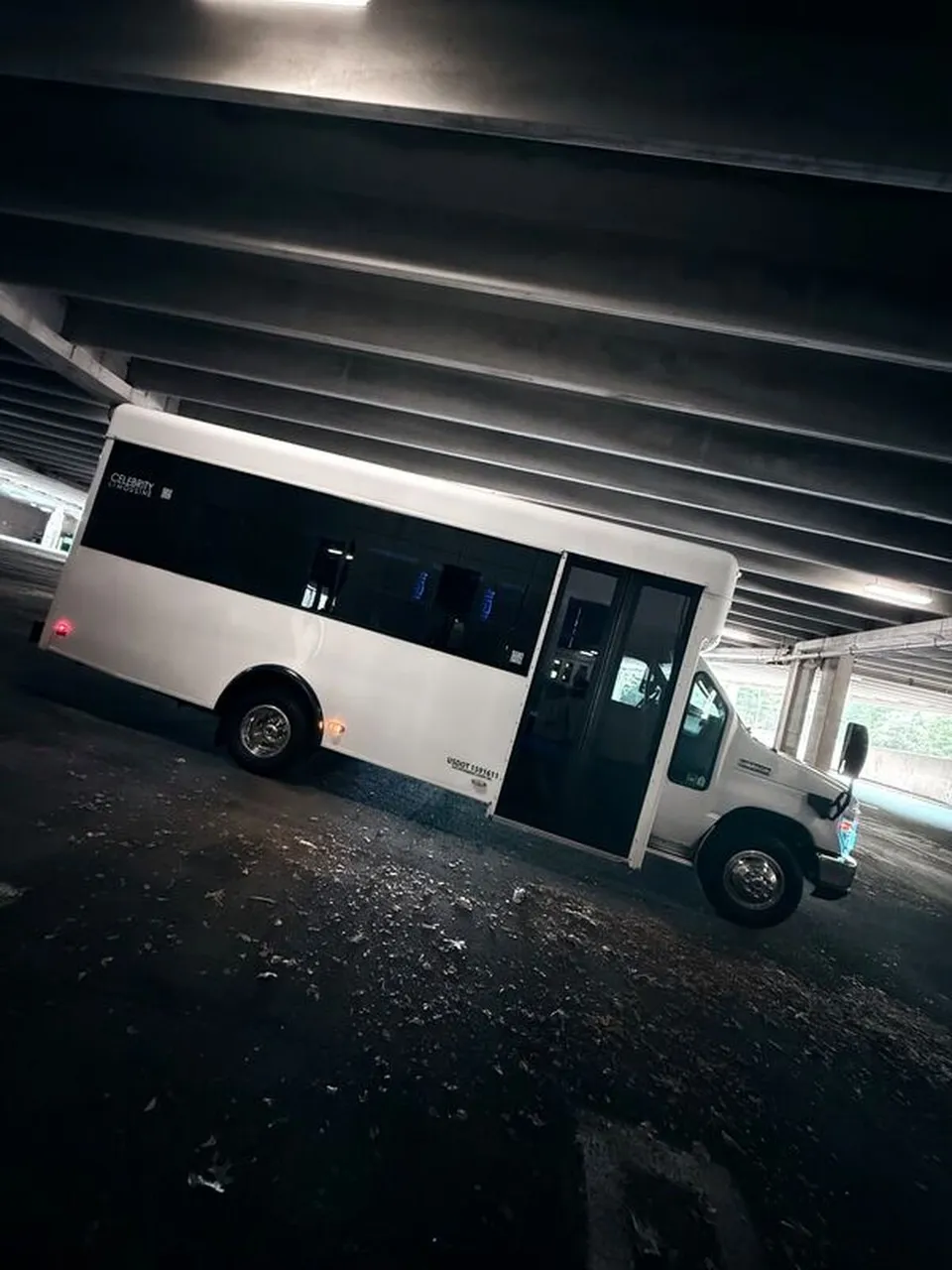 White Ford E-450 Series Party Bus exterior for party bus rental White Ford E-450 Series Party Bus exterior for party bus rental