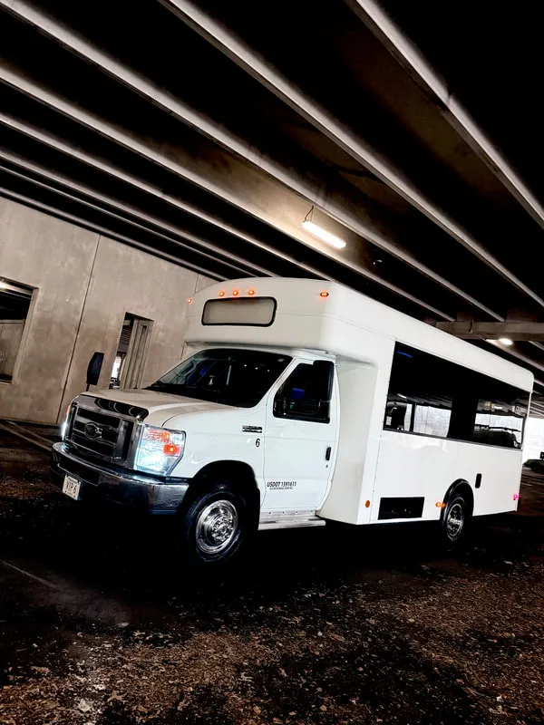 White Ford E-450 Series Party Bus exterior, photo 4 for party bus rental White Ford E-450 Series Party Bus exterior, photo 4 for party bus rental