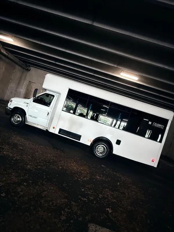 White Ford E-450 Series Party Bus exterior, photo 7 for party bus rental in North Attleboro, MA White Ford E-450 Series Party Bus exterior, photo 7 for party bus rental in North Attleboro, MA