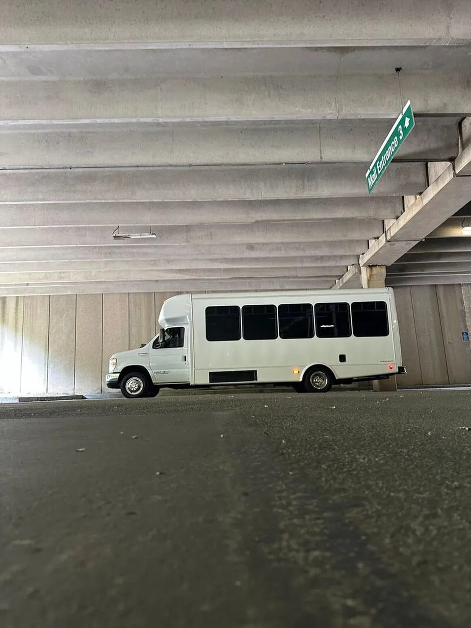 White Ford E-450 Series Party Bus exterior for party bus rental in North Attleboro, MA