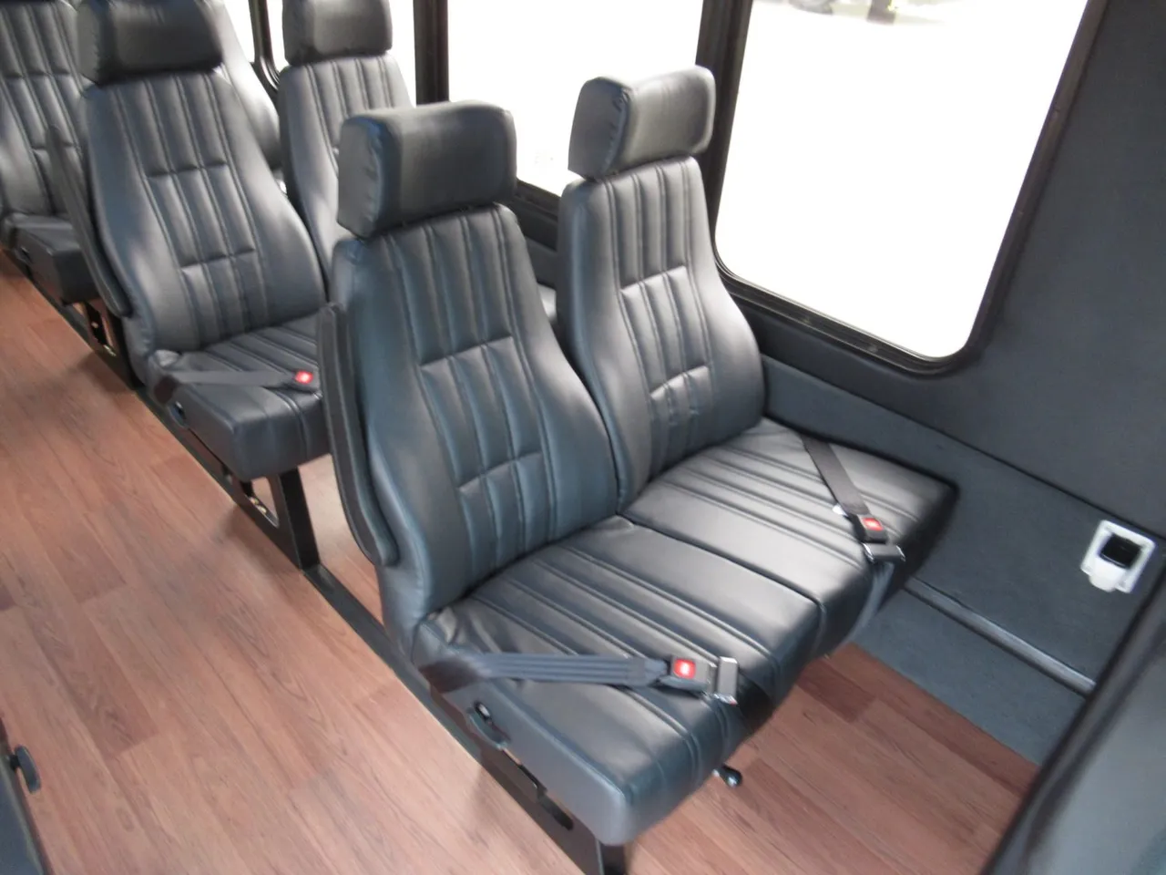 Black Ford F600 Executive VIP Shuttle Bus (32 Passengers), photo 4 for minibus rental in Arizona