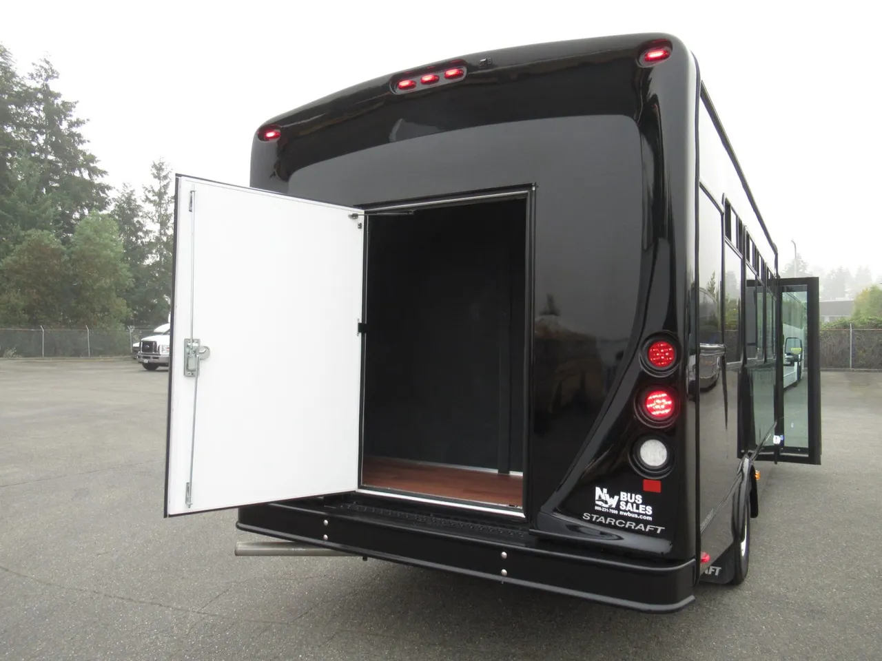 Black Ford E450 Executive VIP Shuttle Bus(24 Passengers) exterior, photo 6 for winery tour transport in Montana