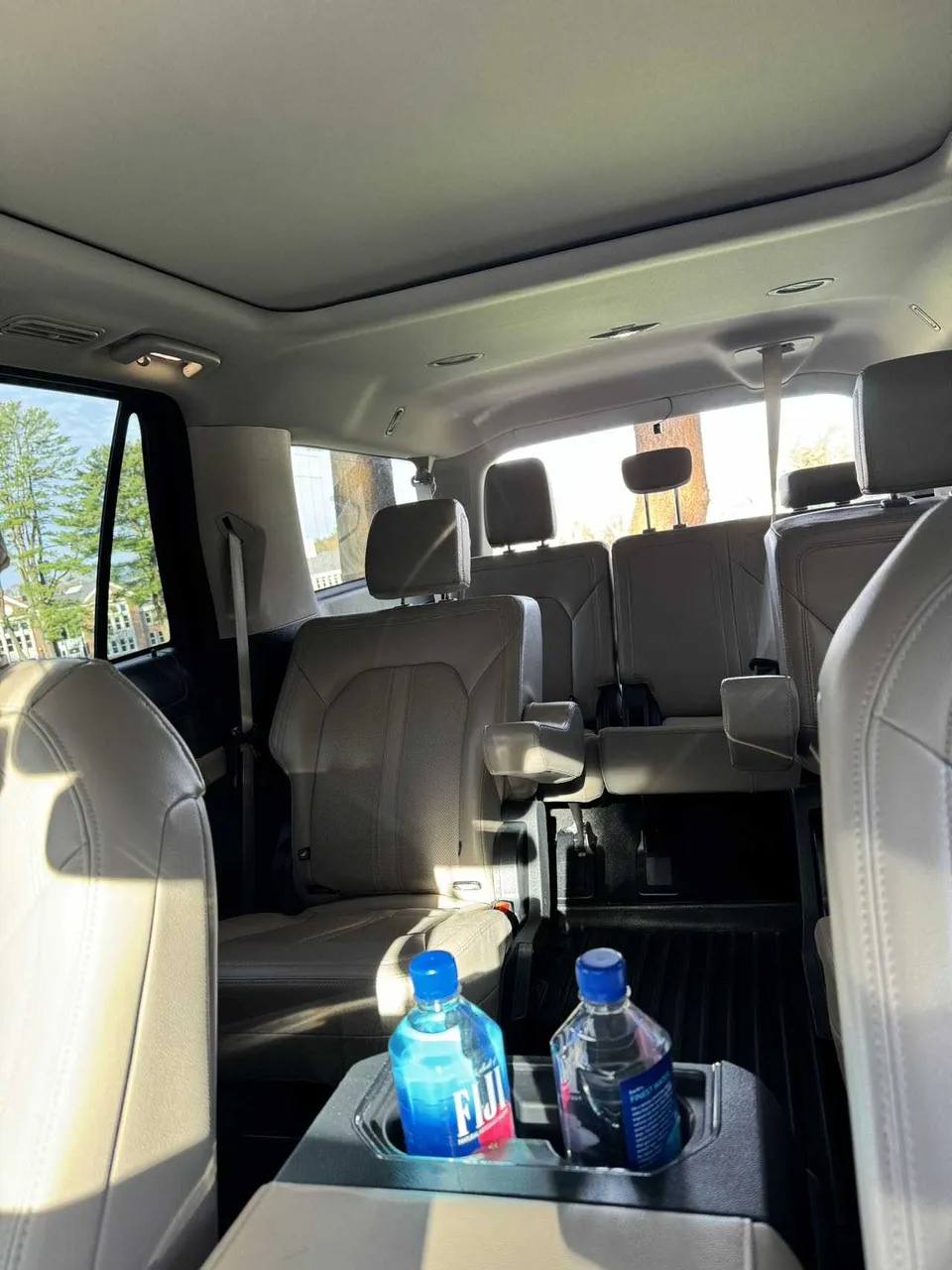 Ford Expedition MAX interior with captain's chairs and cup holders, photo 8 for chauffeur car rental in Tamworth, NH