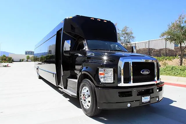 Black Ford F600 Executive VIP Shuttle Bus (32 Passengers), photo 2 for minibus rental in Hughes Springs, TX