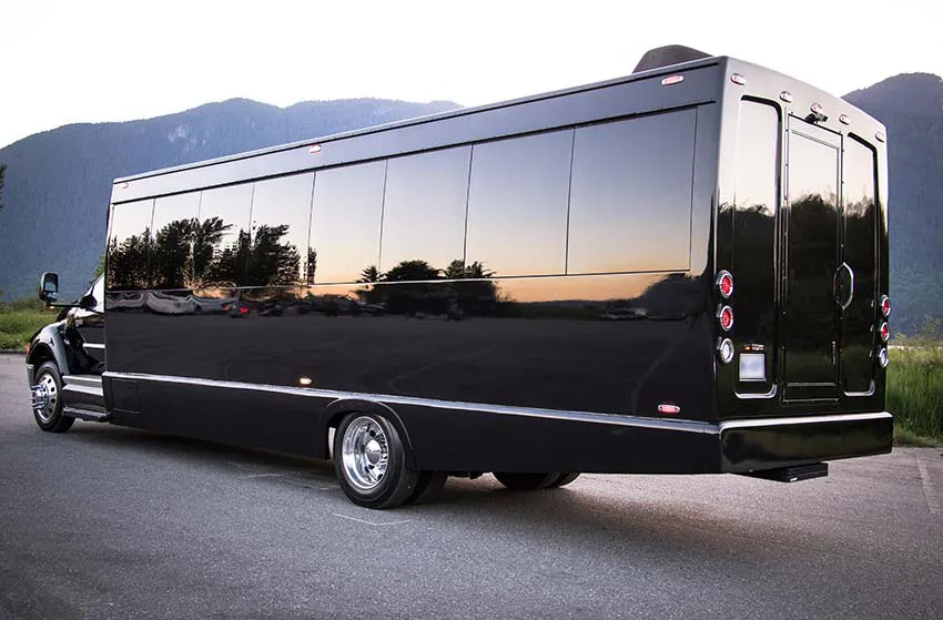 Black Ford F600 Executive VIP Shuttle Bus (32 Passengers), photo 4 for minibus rental in Hughes Springs, TX