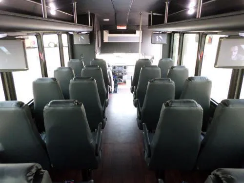 Black Ford F600 Executive VIP Shuttle Bus (32 Passengers), photo 6 for winery tour transport in Quitman, TX