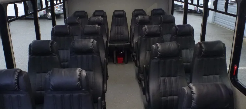 32 Passenger Ford F600 Executive VIP Shuttle Bus interior for charter bus rental in Kenmore, WA