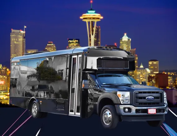 Black Ford F600 Executive VIP Shuttle Bus (32 Passengers) for minibus rental in Hughes Springs, TX