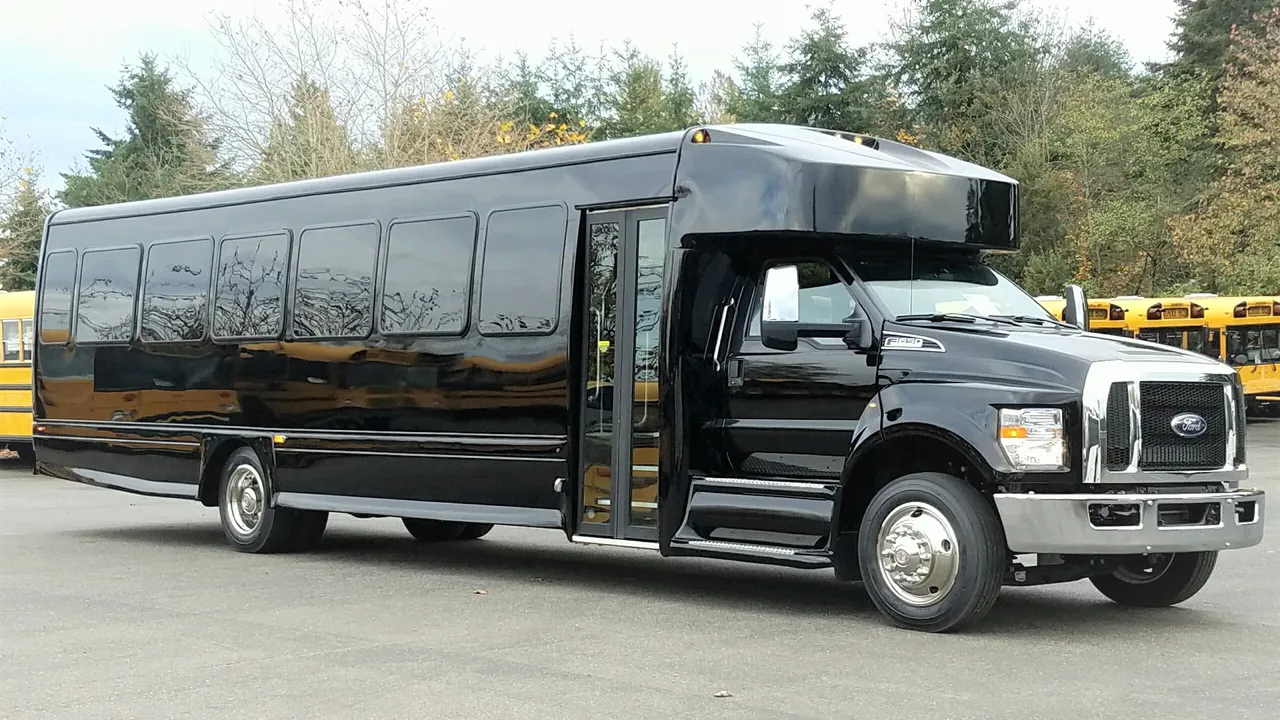 Black Ford F650 Executive VIP Shuttle Bus (44 Passenger), photo 2 for charter bus rental in Patriot, IN