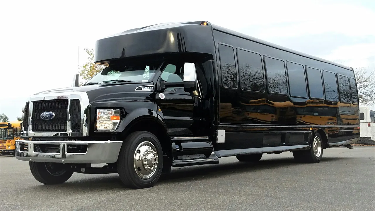 Black Ford F650 Executive VIP Shuttle Bus (44 Passenger), photo 3 for charter bus rental in Patriot, IN