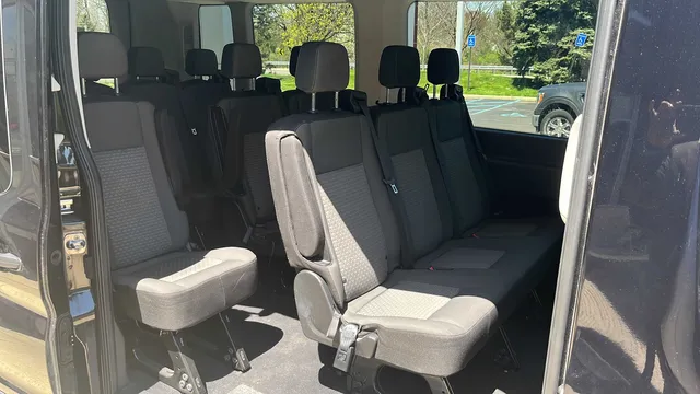 Ford Transit Passenger Van interior for mini coach rental in Branch, MI