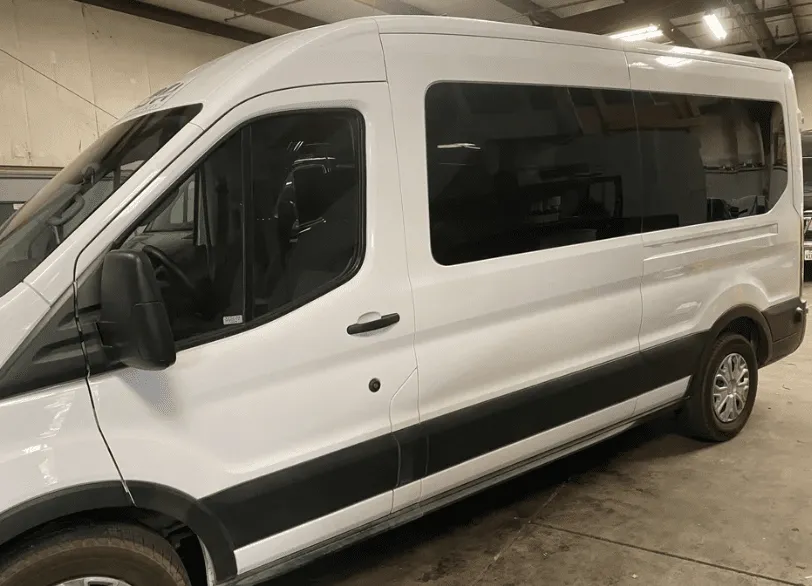 White Ford Transit for mini coach rental in Kingsburg, CA